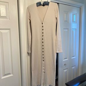 Beautiful ribbed dress. Polyester, rayon and spandex.